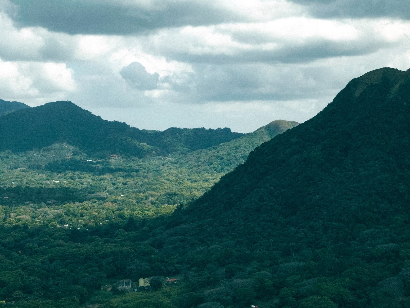 A breathtaking aerial view of lush green mountains in El Valle de Antón, Panama.